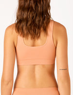 Bare Essentials Recycled Nylon Reversible Padded Crop - Spiced Peach